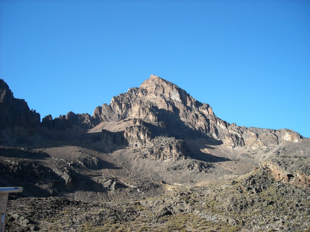 Snow patches and clouds at high altitude on Kilimanjaro summit approach