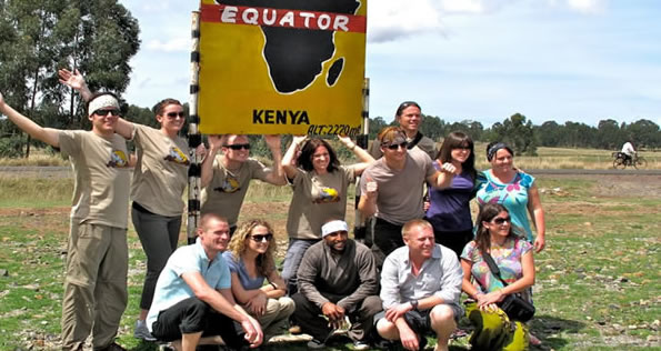 Tourists taking a memorable group photo on an African safari